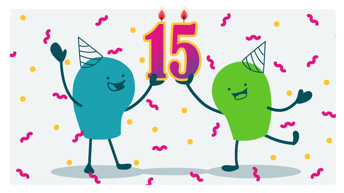 2 doodles with birthday hats on hold up a 15th birthday candle